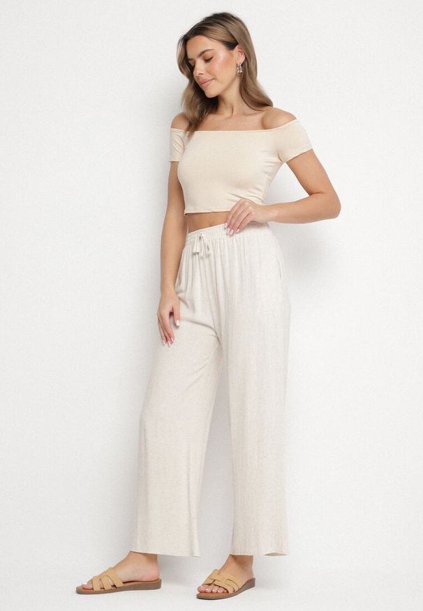 Born2be - Beżowe Spodnie z Lnem o Szerokim Kroju z Wysokim Stanem Sanoreth. Okazja: na spacer, na co dzień. Stan: podwyższony. Kolor: beżowy. Materiał: len. Długość: długie. Styl: casual