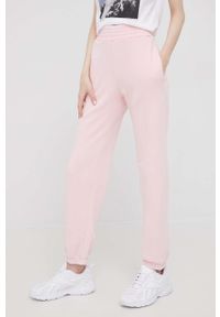 United Colors of Benetton spodnie dresowe bawełniane damskie kolor różowy gładkie. Kolor: różowy. Materiał: dresówka, bawełna. Wzór: gładki