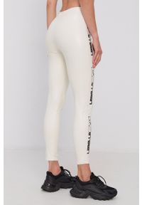 LABELLAMAFIA - LaBellaMafia Spodnie damskie kolor kremowy. Kolor: beżowy. Materiał: skóra. Wzór: nadruk #3