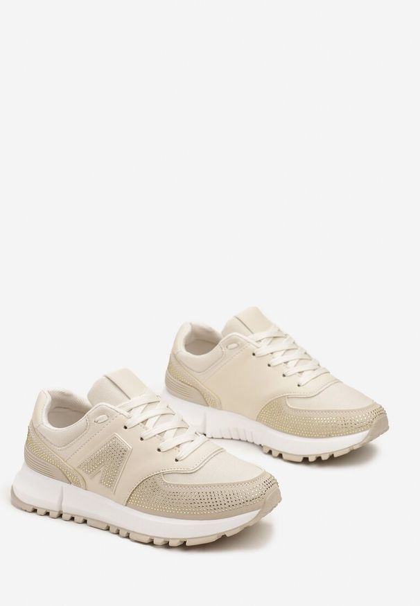 Renee - Beżowe Sneakersy Ozdobione Cyrkoniami na Podeszwie z Wycięciami Larzive. Kolor: beżowy. Wzór: aplikacja. Obcas: na płaskiej podeszwie