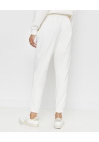 JENESEQUA - Białe spodnie dresowe. Kolor: biały. Materiał: dresówka. Wzór: aplikacja