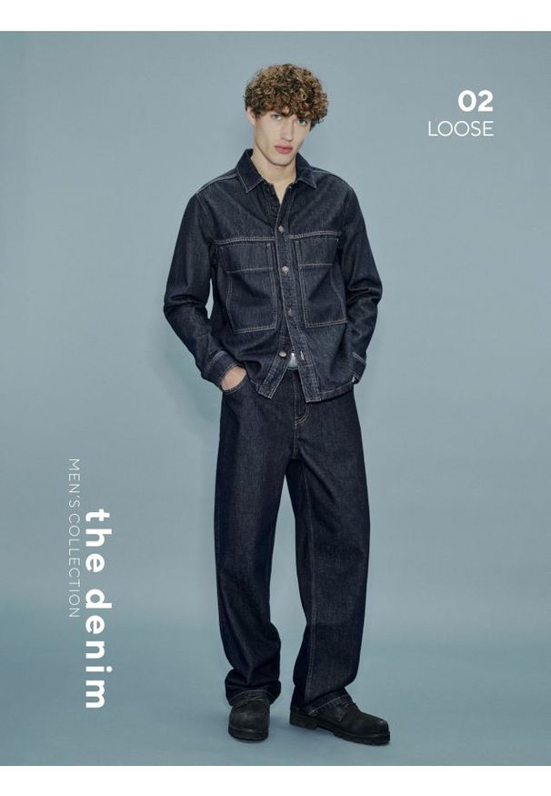 Reserved - Jeansy loose fit - granatowy. Kolor: niebieski