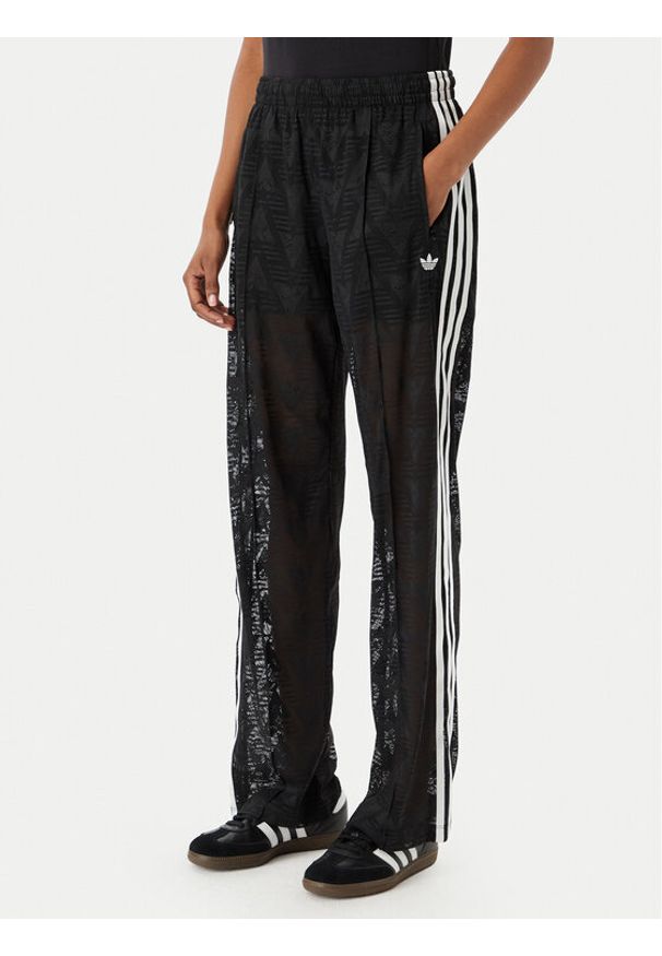 Adidas - adidas Spodnie dzianinowe Crochet Firebird KD0346 Czarny Regular Fit. Kolor: czarny. Materiał: syntetyk
