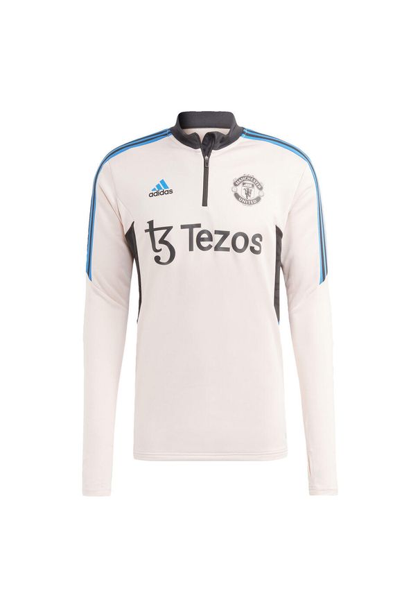 Adidas - Kurtka z dresu Manchester United Condivo 2022/23. Kolor: różowy. Materiał: dresówka. Sport: piłka nożna