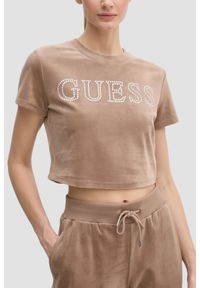 Guess - GUESS Brązowy top damski Couture Tee. Kolor: brązowy