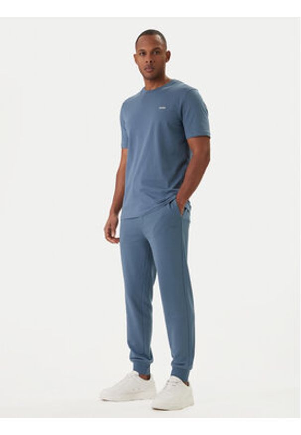 Hugo - HUGO Spodnie dresowe Dayote232 50489617 Niebieski Regular Fit. Kolor: niebieski. Materiał: bawełna
