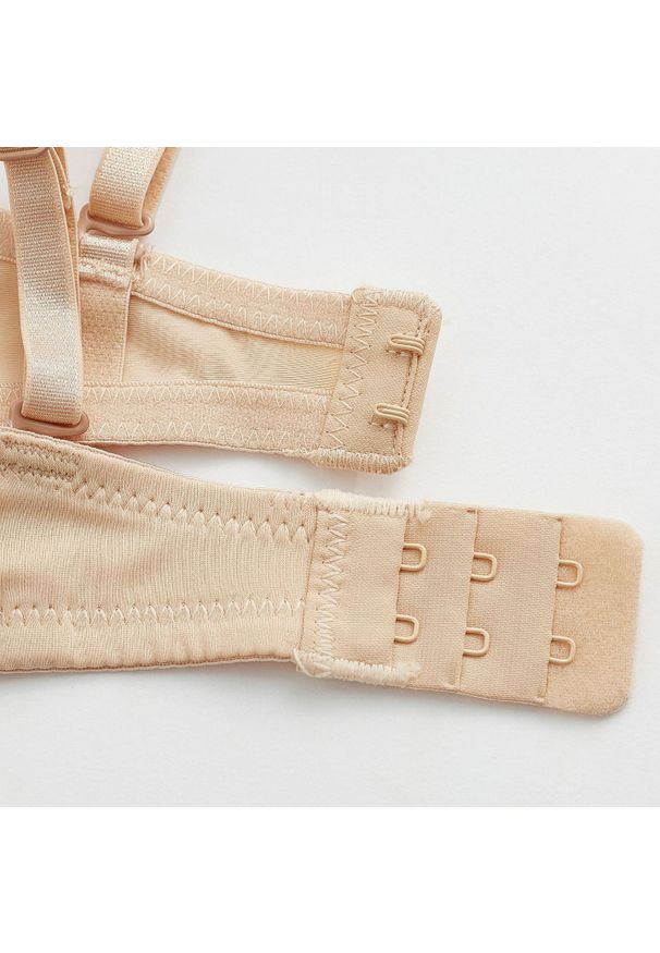 Intica - Biustonosz balkonetka gładki niewidoczny pod ubraniem Cymbre. Kolor: biały. Materiał: skóra. Wzór: gładki