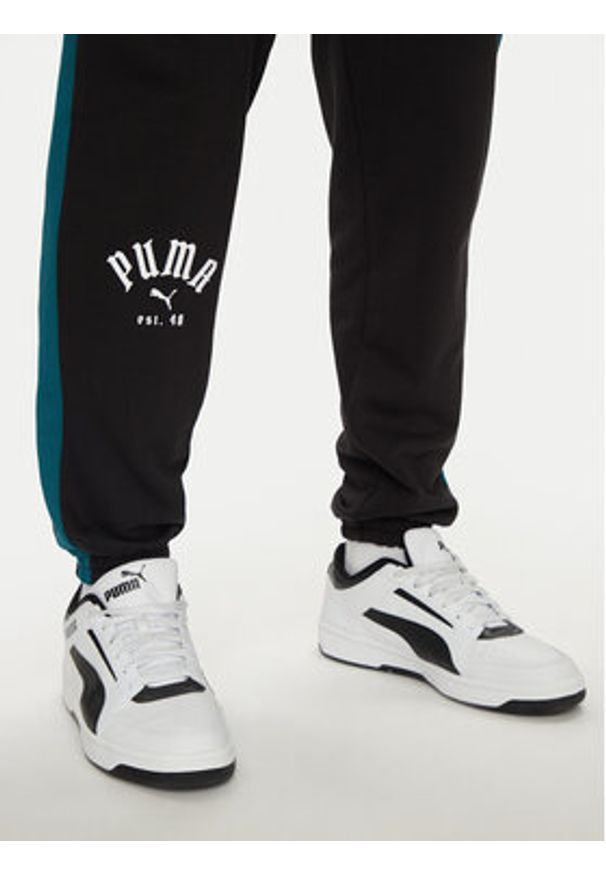 Puma Spodnie dresowe T7 PLAY.PARIS 626768 01 Czarny Regular Fit. Kolor: czarny. Materiał: bawełna, materiał