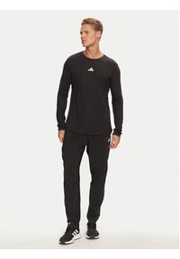 Adidas - adidas Spodnie dresowe Own The Run IK5024 Czarny Regular Fit. Kolor: czarny. Materiał: syntetyk. Sport: bieganie