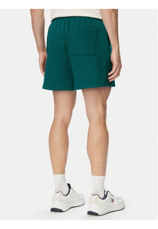 Tommy Jeans Szorty sportowe DM0DM21931 Zielony ciemny Regular Fit. Kolor: zielony. Materiał: bawełna. Styl: sportowy