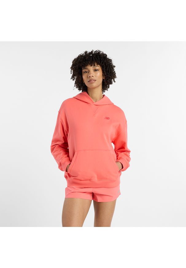 Bluza damska New Balance WT41537DTR – pomarańczowa. Okazja: na co dzień. Kolor: pomarańczowy. Materiał: dresówka, prążkowany, bawełna. Wzór: ze splotem. Styl: klasyczny, casual