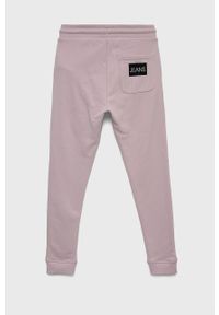 Calvin Klein Jeans spodnie dresowe bawełniane dziecięce kolor różowy z nadrukiem. Kolor: różowy. Materiał: bawełna, dresówka. Wzór: nadruk #2