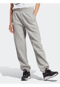 Adidas - adidas Spodnie dresowe Essentials Fleece IA6432 Szary Regular Fit. Kolor: szary. Materiał: bawełna #1