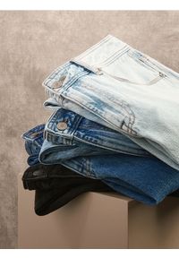 Reserved - Jeansy carrot fit - niebieski. Kolor: niebieski