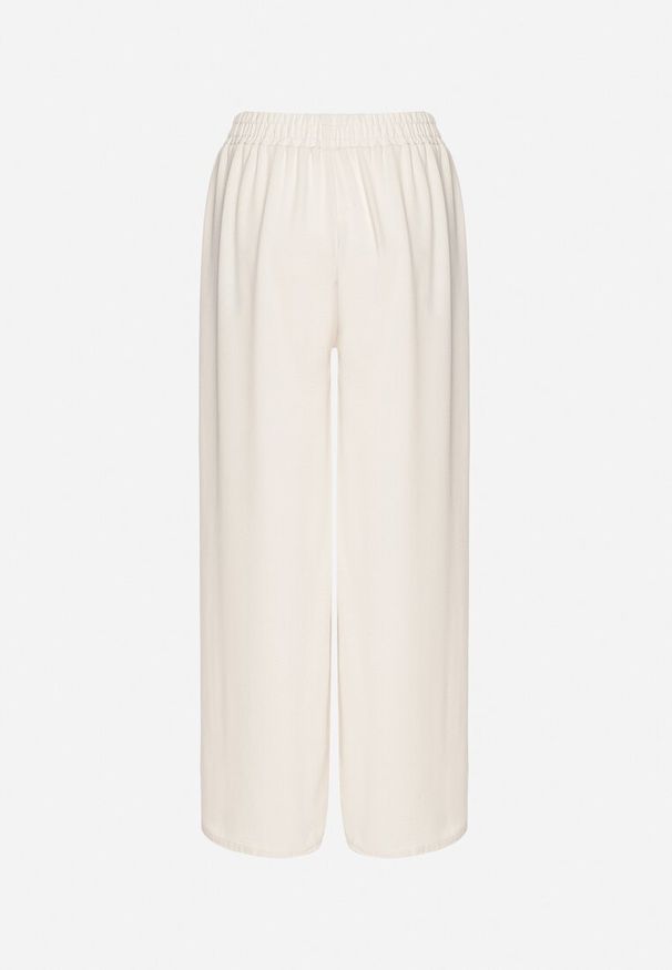 Born2be - Jasnobeżowe Szerokie Spodnie z Bawełną Wysokim Stanem i Guzikami Avelritia. Okazja: na co dzień. Stan: podwyższony. Kolor: beżowy. Materiał: bawełna. Styl: klasyczny, casual, elegancki