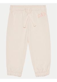 GAP - Gap Spodnie dresowe 876617-01 Różowy Regular Fit. Kolor: różowy. Materiał: bawełna #1