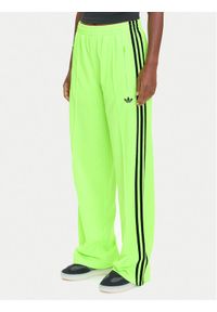 Adidas - adidas Spodnie dresowe adicolor Classic Firebird JW1228 Zielony Loose Fit. Kolor: zielony. Materiał: syntetyk