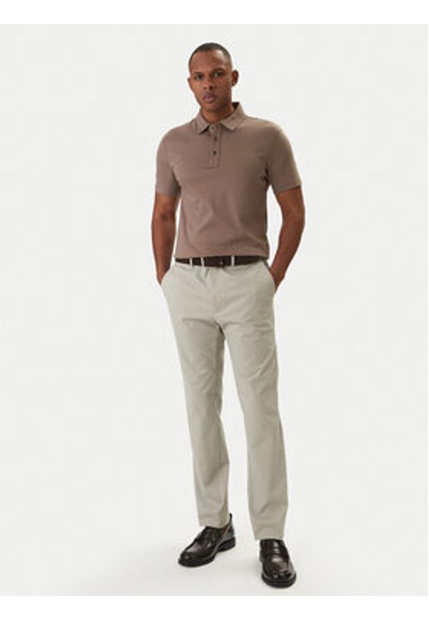 Calvin Klein Chinosy LV04LD613G Beżowy Slim Fit. Kolor: beżowy. Materiał: bawełna