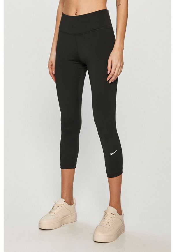 Nike - Legginsy. Kolor: czarny. Materiał: dzianina, skóra, elastan, tkanina, poliester, włókno. Wzór: gładki