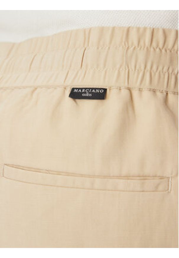 Marciano Guess Spodnie materiałowe 5GHB03 2310Z Beżowy Regular Fit. Kolor: beżowy. Materiał: syntetyk