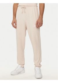 Adidas - adidas Spodnie dresowe ALL SZN 3-Stripes IR5201 Różowy Regular Fit. Kolor: różowy. Materiał: bawełna #1