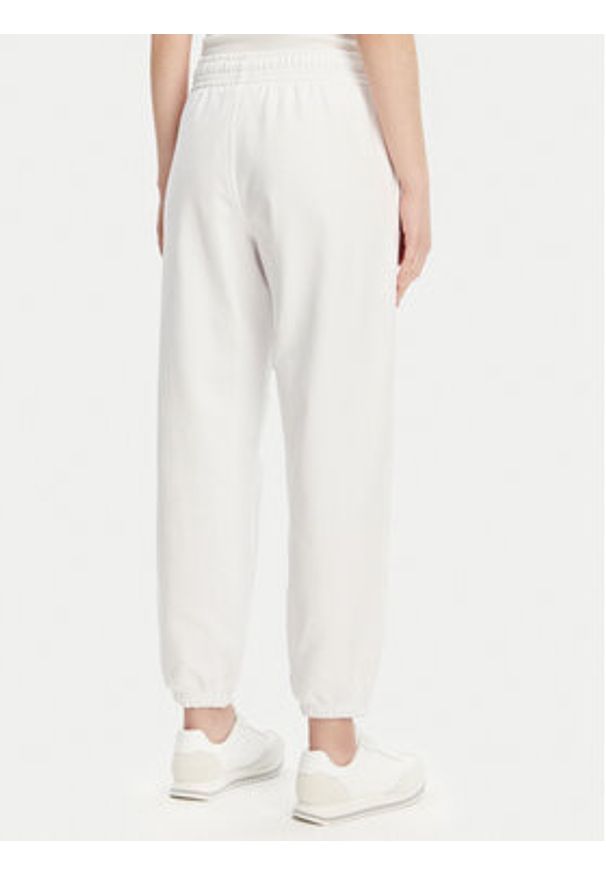 Calvin Klein Jeans Spodnie dresowe Monologo LV047B235G Biały Regular Fit. Kolor: biały. Materiał: bawełna