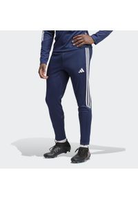 Adidas - Tiro 23 Club Training Pants. Kolor: niebieski, wielokolorowy, biały. Materiał: dresówka, materiał