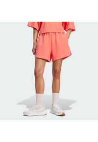 Adidas - Szorty Soft Lux Loose. Kolor: żółty, pomarańczowy, wielokolorowy. Sport: fitness #1