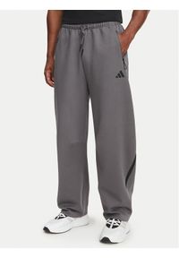 Adidas - adidas Spodnie dresowe Z.N.E. Open Hem KX7695 Szary ciemny Loose Fit. Kolor: szary. Materiał: syntetyk #1