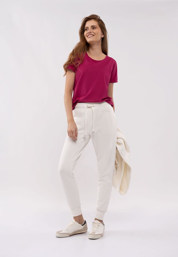 Volcano - Dresowe spodnie N-VENIS. Materiał: dresówka. Wzór: napisy