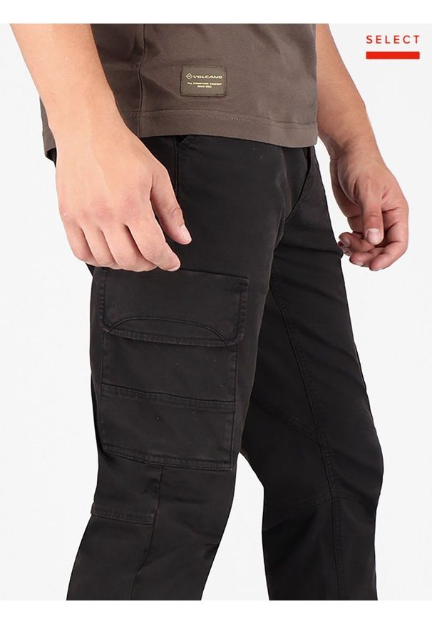 Volcano - Męskie spodnie bojówki ze ściągaczami na dole R‑ALPIN. Stan: obniżony. Kolor: czarny. Materiał: elastan, skóra, bawełna. Styl: sportowy