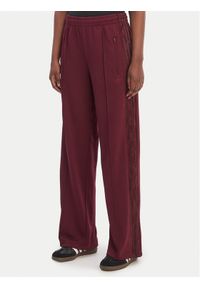 Adidas - adidas Spodnie dresowe Firebird Lace KC6445 Bordowy Loose Fit. Kolor: czerwony. Materiał: syntetyk #1