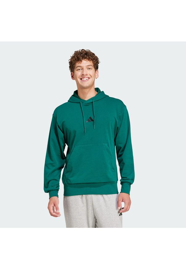 Adidas - Bluza z kapturem Essentials Feelcozy French Terry. Typ kołnierza: kaptur. Kolor: zielony, czarny, wielokolorowy. Materiał: materiał. Sport: fitness