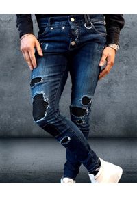GUNS & TUXEDOS - Niebieskie jeansy z łatami Hooligan. Kolor: niebieski. Wzór: aplikacja #2