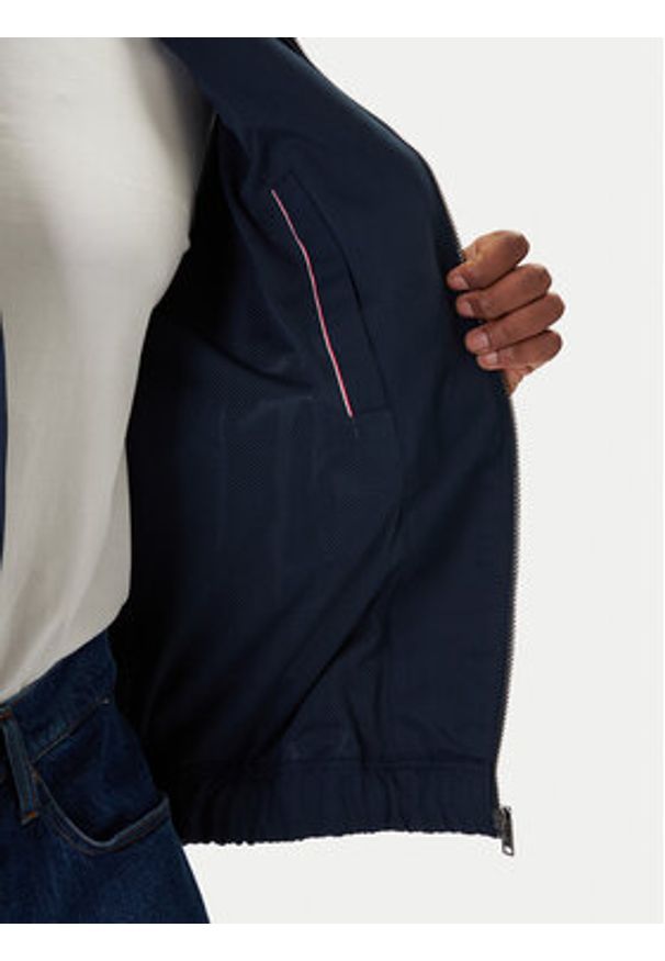 Tommy Jeans Kurtka przejściowa Essential DM0DM22720 Granatowy Regular Fit. Kolor: niebieski. Materiał: syntetyk