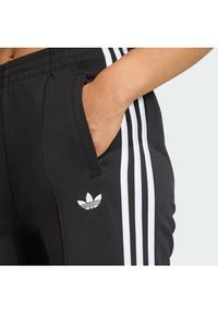 Adidas - adidas Spodnie dresowe adicolor SST Classic KD5570 Czarny Slim Fit. Kolor: czarny. Materiał: bawełna #3