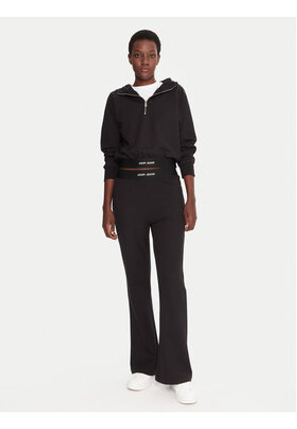JOOP! Jeans Spodnie dresowe Tuvana 30048514 Czarny Relaxed Fit. Kolor: czarny. Materiał: bawełna