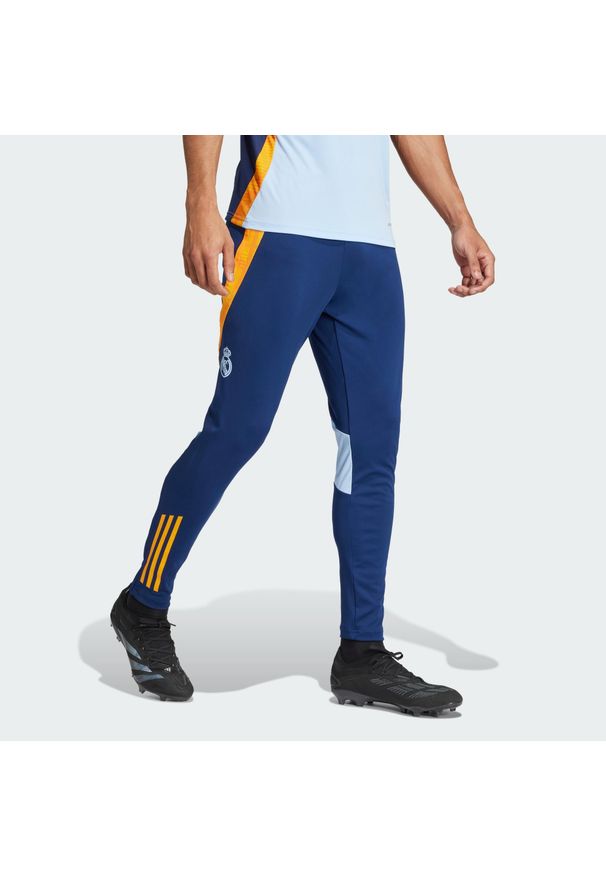 Adidas - Spodnie Real Madrid Tiro 24 Competition Training. Kolor: niebieski, wielokolorowy, pomarańczowy. Materiał: poliester, materiał. Sport: piłka nożna