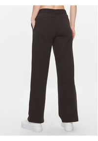 Puma Spodnie dresowe Ess+ 676093 Czarny Regular Fit. Kolor: czarny. Materiał: bawełna #3