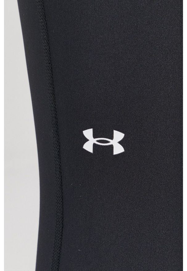Under Armour - Legginsy. Stan: podwyższony. Kolor: czarny. Materiał: tkanina, dzianina, skóra. Wzór: gładki