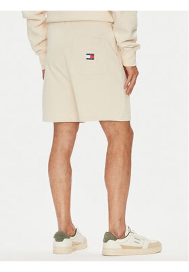 Tommy Jeans Szorty sportowe New Classic Beach DM0DM21781 Beżowy Relaxed Fit. Kolor: beżowy. Materiał: bawełna. Styl: sportowy