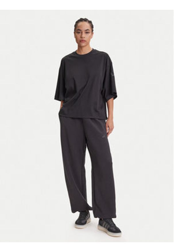 Adidas - adidas Spodnie dresowe ALL SZN Soft Lux lJM1652 Czarny Loose Fit. Kolor: czarny. Materiał: syntetyk