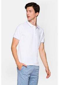 Lancerto - Koszulka Biała Polo Dominic. Typ kołnierza: polo. Kolor: biały. Materiał: tkanina, bawełna, włókno, materiał. Długość rękawa: krótki rękaw. Wzór: ze splotem. Styl: klasyczny #1