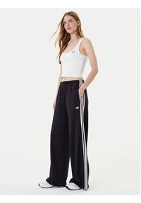 Adidas - adidas Spodnie dresowe adicolor 3-Stripes JV7473 Czarny Wide Leg. Kolor: czarny. Materiał: bawełna #4