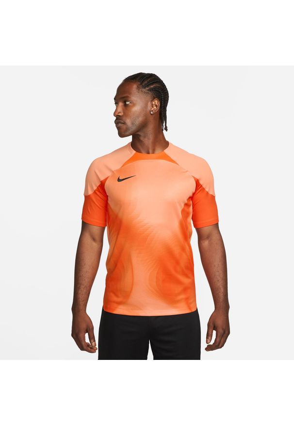Koszulka treningowa męska Nike Gardien IV. Kolor: pomarańczowy, żółty, wielokolorowy. Długość rękawa: krótki rękaw. Długość: krótkie. Sport: piłka nożna