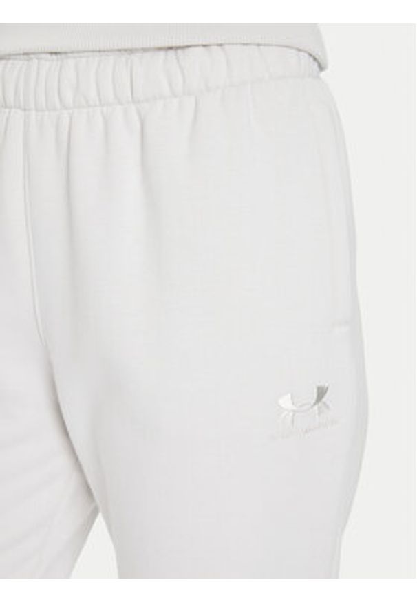 Under Armour Spodnie dresowe Ua Icon 6003676 Écru Loose Fit. Materiał: bawełna