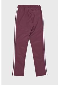 adidas Originals spodnie dresowe Adicolor męskie kolor fioletowy z aplikacją. Kolor: fioletowy. Materiał: dresówka. Wzór: aplikacja