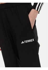 Adidas - adidas Spodnie outdoor Multi Essentials JP0806 Czarny Regular Fit. Kolor: czarny. Materiał: syntetyk. Sport: outdoor #3