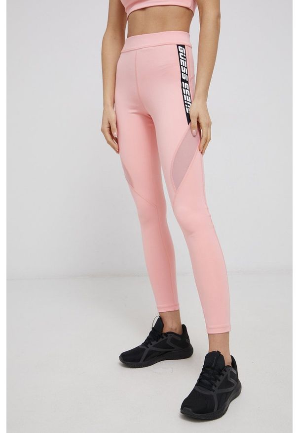 Guess - Legginsy. Kolor: różowy. Materiał: skóra, dzianina. Wzór: nadruk