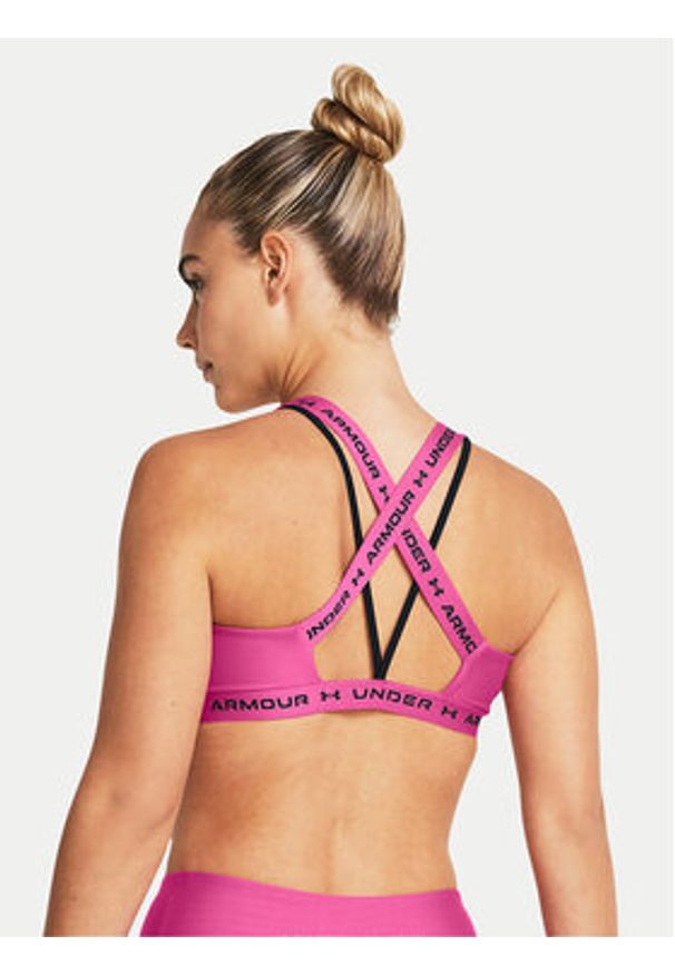 Under Armour Biustonosz sportowy Crossback Low 1361033-686 Różowy Compression Fit. Kolor: różowy. Materiał: syntetyk